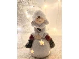 Chłopiec siedzący na kuli świecącej 3488